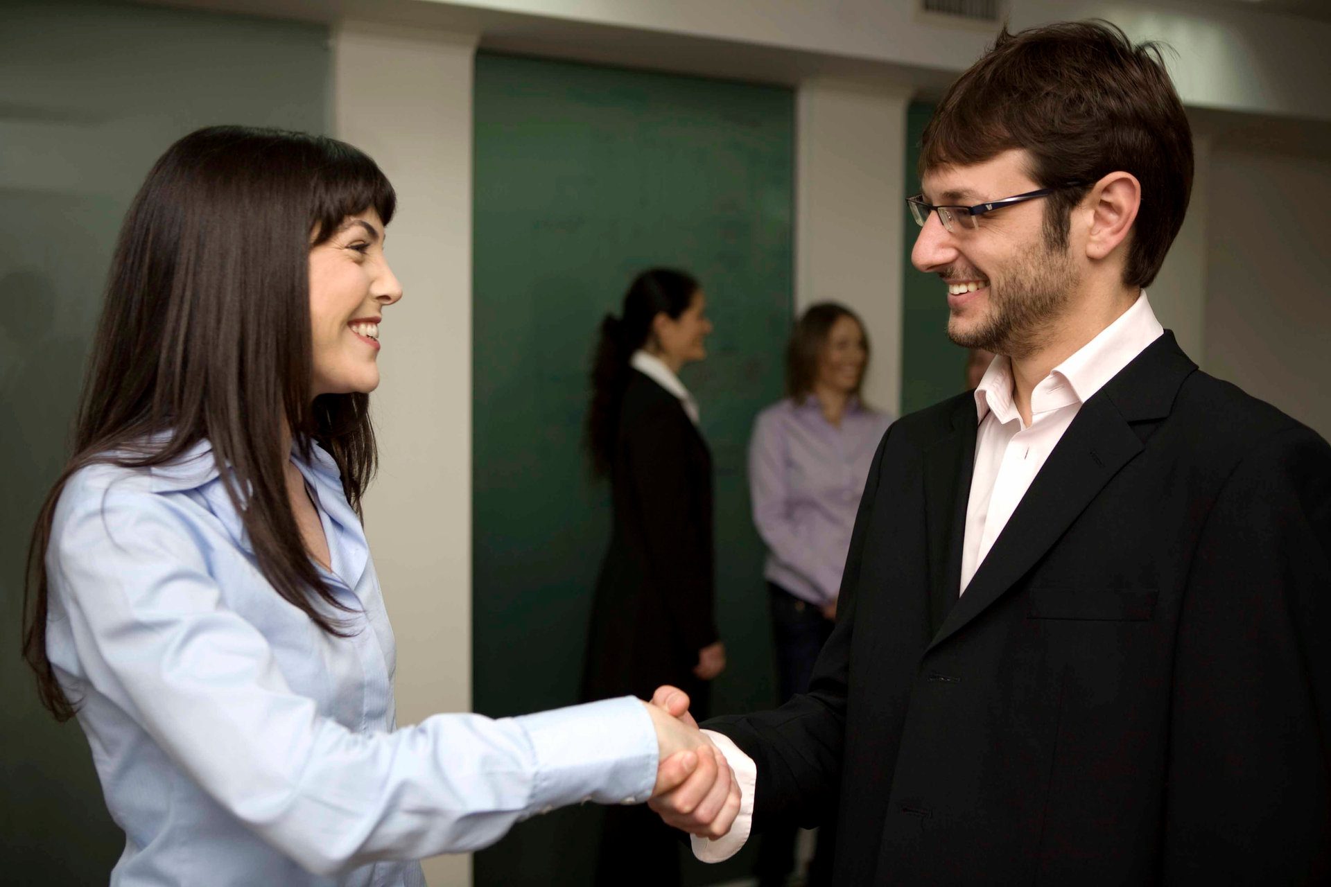 Attorney and client shaking hands